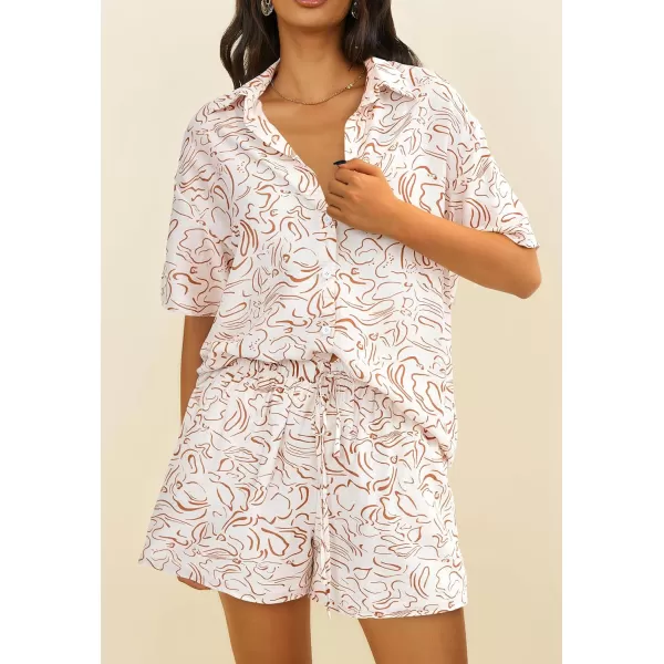 imagePRETTYGARDEN Women Summer 2 Piece Beach Outfits Printed Short Sleeve Tops Lounge Shorts Casual Tracksuit SetBeige