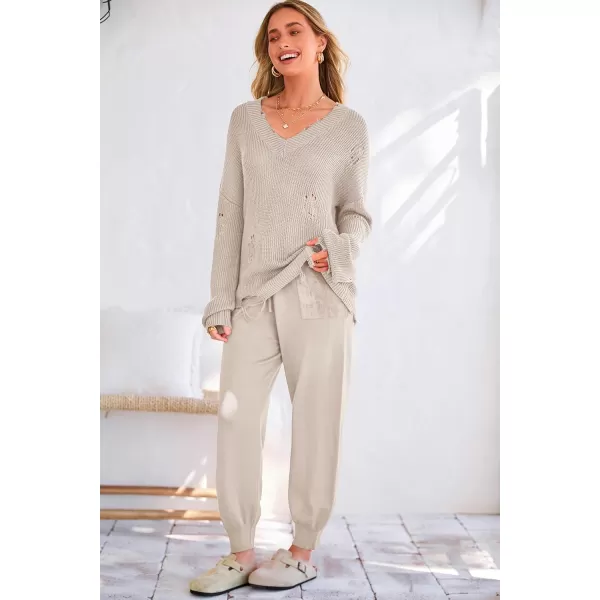 imagePRETTYGARDEN Womens 2 Piece Outfits 2023 Fall V Neck Ripped Knit Pullover Sweater And Long Pants Tracksuit SetBeige