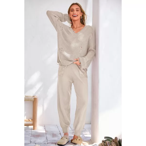 imagePRETTYGARDEN Womens 2 Piece Outfits 2023 Fall V Neck Ripped Knit Pullover Sweater And Long Pants Tracksuit SetBeige