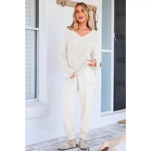 imagePRETTYGARDEN Womens 2 Piece Outfits 2023 Fall V Neck Ripped Knit Pullover Sweater And Long Pants Tracksuit SetWhite