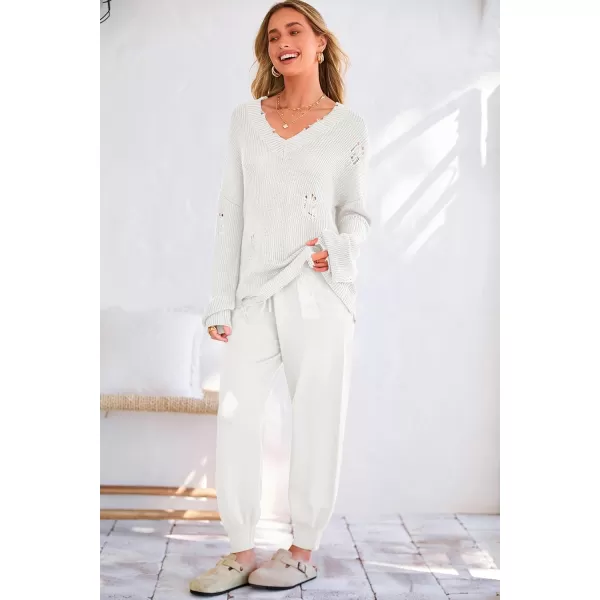 imagePRETTYGARDEN Womens 2 Piece Outfits 2023 Fall V Neck Ripped Knit Pullover Sweater And Long Pants Tracksuit SetWhite