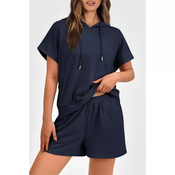 imagePRETTYGARDEN Womens 2 Piece Outfits Summer Cap Sleeve Hoodie Tops And Lounge Shorts Sweatsuits SetsNavy