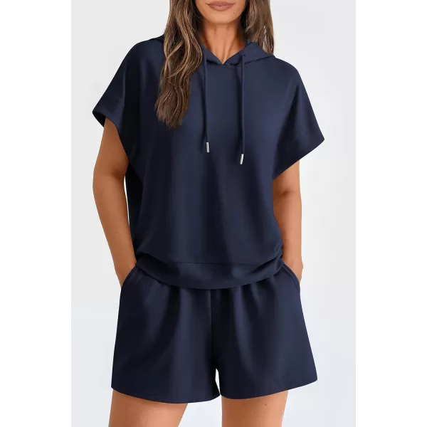 imagePRETTYGARDEN Womens 2 Piece Outfits Summer Cap Sleeve Hoodie Tops And Lounge Shorts Sweatsuits SetsNavy