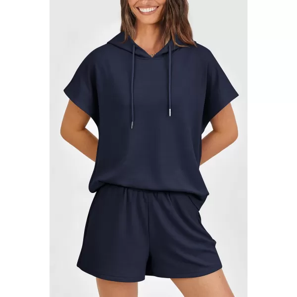 imagePRETTYGARDEN Womens 2 Piece Outfits Summer Cap Sleeve Hoodie Tops And Lounge Shorts Sweatsuits SetsNavy