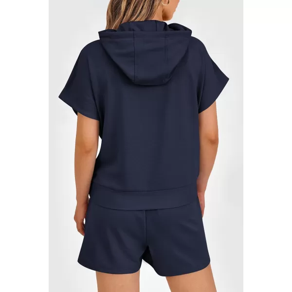 imagePRETTYGARDEN Womens 2 Piece Outfits Summer Cap Sleeve Hoodie Tops And Lounge Shorts Sweatsuits SetsNavy
