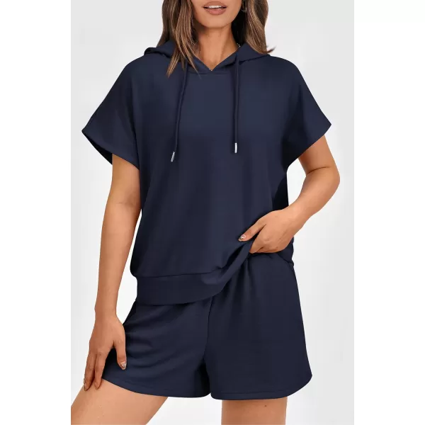 imagePRETTYGARDEN Womens 2 Piece Outfits Summer Cap Sleeve Hoodie Tops And Lounge Shorts Sweatsuits SetsNavy