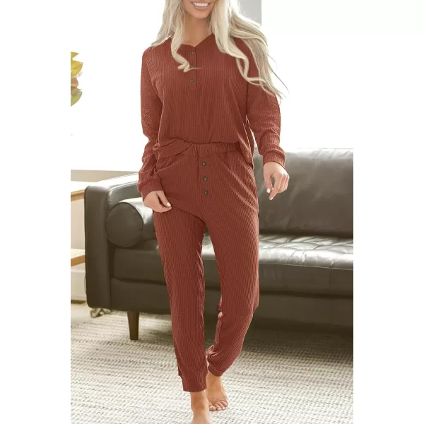 imagePRETTYGARDEN Womens 2 Piece Waffle Knit Lounge Outfit Long Sleeve Henley Top and Sweatpants Set TracksuitRust Red