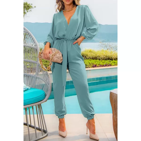 imagePRETTYGARDEN Womens 2023 Fall Jumpsuits Casual Dressy One Piece Outfits V Neck Long Sleeve Belt Pockets Long Pants RomperBlue Green