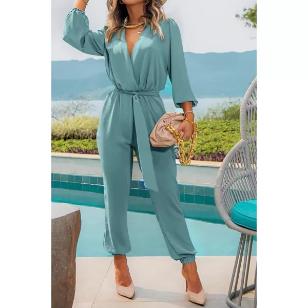 imagePRETTYGARDEN Womens 2023 Fall Jumpsuits Casual Dressy One Piece Outfits V Neck Long Sleeve Belt Pockets Long Pants RomperBlue Green