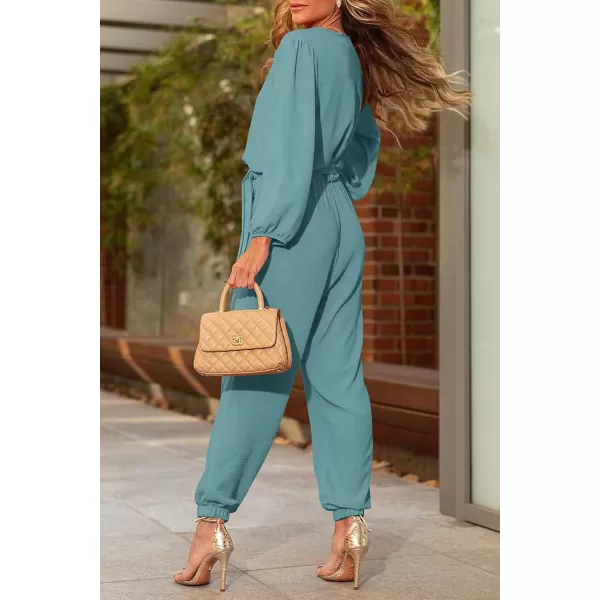 imagePRETTYGARDEN Womens 2023 Fall Jumpsuits Casual Dressy One Piece Outfits V Neck Long Sleeve Belt Pockets Long Pants RomperBlue Green