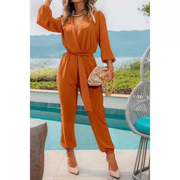 imagePRETTYGARDEN Womens 2023 Fall Jumpsuits Casual Dressy One Piece Outfits V Neck Long Sleeve Belt Pockets Long Pants RomperBrown Yellow