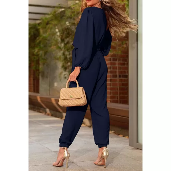 imagePRETTYGARDEN Womens 2023 Fall Jumpsuits Casual Dressy One Piece Outfits V Neck Long Sleeve Belt Pockets Long Pants RomperNavy