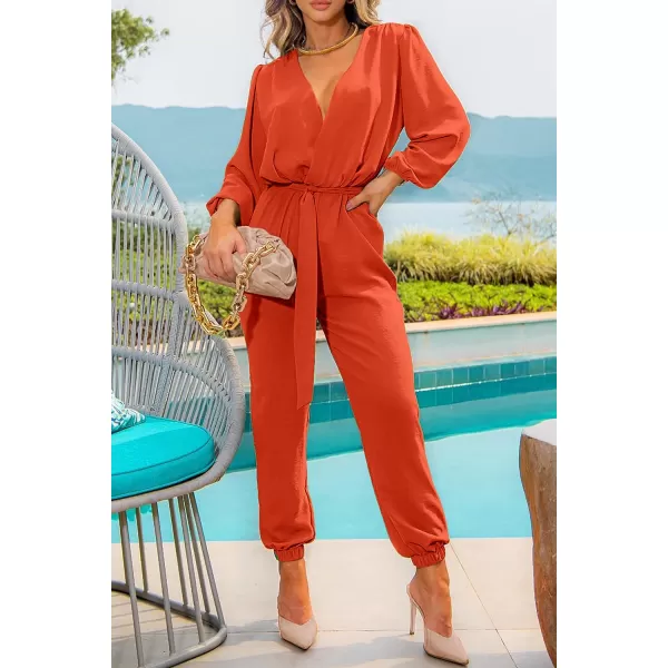 imagePRETTYGARDEN Womens 2023 Fall Jumpsuits Casual Dressy One Piece Outfits V Neck Long Sleeve Belt Pockets Long Pants RomperOrange