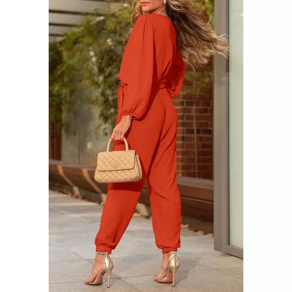 imagePRETTYGARDEN Womens 2023 Fall Jumpsuits Casual Dressy One Piece Outfits V Neck Long Sleeve Belt Pockets Long Pants RomperOrange