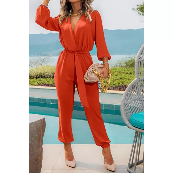 imagePRETTYGARDEN Womens 2023 Fall Jumpsuits Casual Dressy One Piece Outfits V Neck Long Sleeve Belt Pockets Long Pants RomperOrange