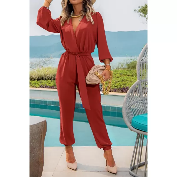 imagePRETTYGARDEN Womens 2023 Fall Jumpsuits Casual Dressy One Piece Outfits V Neck Long Sleeve Belt Pockets Long Pants RomperRust Red