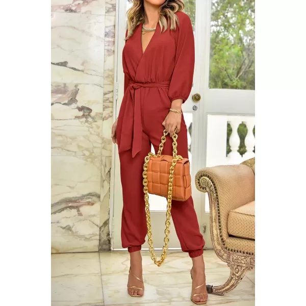 imagePRETTYGARDEN Womens 2023 Fall Jumpsuits Casual Dressy One Piece Outfits V Neck Long Sleeve Belt Pockets Long Pants RomperRust Red
