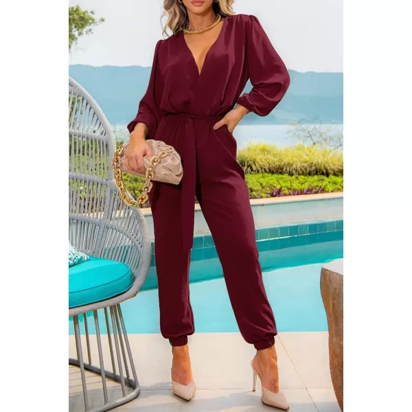 imagePRETTYGARDEN Womens 2023 Fall Jumpsuits Casual Dressy One Piece Outfits V Neck Long Sleeve Belt Pockets Long Pants RomperWine Red