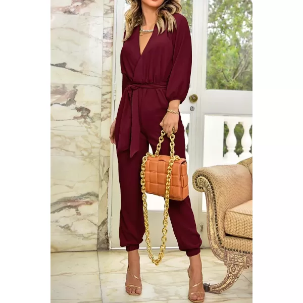 imagePRETTYGARDEN Womens 2023 Fall Jumpsuits Casual Dressy One Piece Outfits V Neck Long Sleeve Belt Pockets Long Pants RomperWine Red