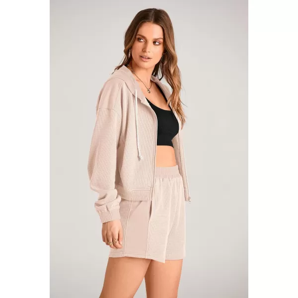 imagePRETTYGARDEN Womens 2023 Fall Two Piece Outfits Waffle Knit Tracksuit Long Sleeve Zip Up Hoodie And Shorts Set Y2K SweatsuitBeige