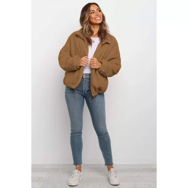 imagePRETTYGARDEN Womens 2023 Fashion Winter Coat Long Sleeve Lapel Zip Up Faux Shearling Shaggy Oversized Shacket JacketStyle One Camel