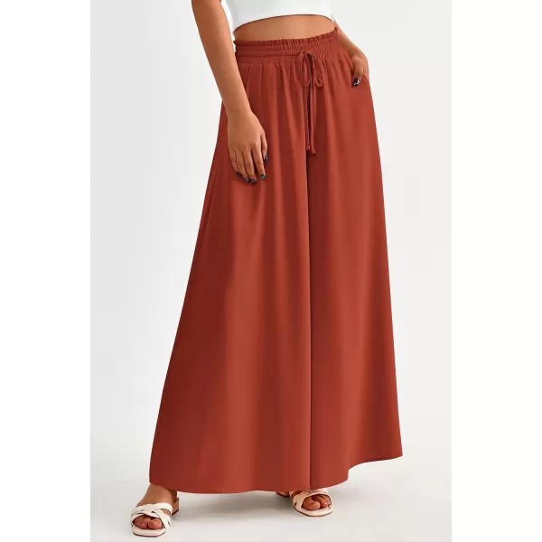 imagePRETTYGARDEN Womens 2024 Summer Wide Leg Palazzo Pants High Waisted Flowy Pockets Trendy Casual Lounge Boho Beach TrousersBrick Red