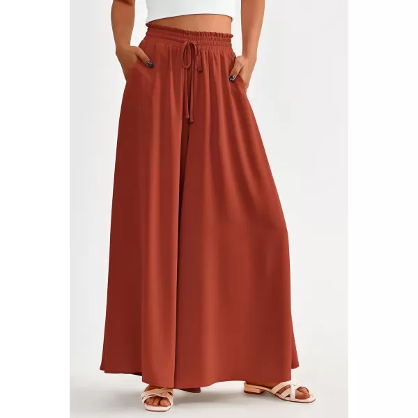 imagePRETTYGARDEN Womens 2024 Summer Wide Leg Palazzo Pants High Waisted Flowy Pockets Trendy Casual Lounge Boho Beach TrousersBrick Red