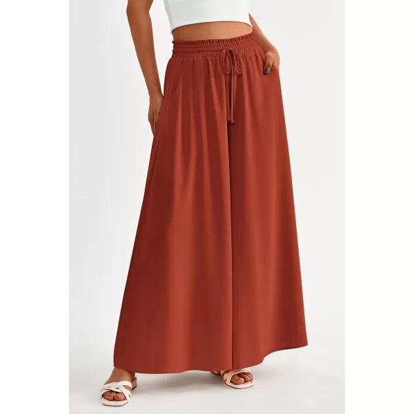 imagePRETTYGARDEN Womens 2024 Summer Wide Leg Palazzo Pants High Waisted Flowy Pockets Trendy Casual Lounge Boho Beach TrousersBrick Red