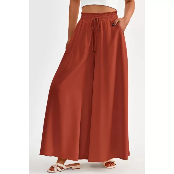imagePRETTYGARDEN Womens 2024 Summer Wide Leg Palazzo Pants High Waisted Flowy Pockets Trendy Casual Lounge Boho Beach TrousersBrick Red