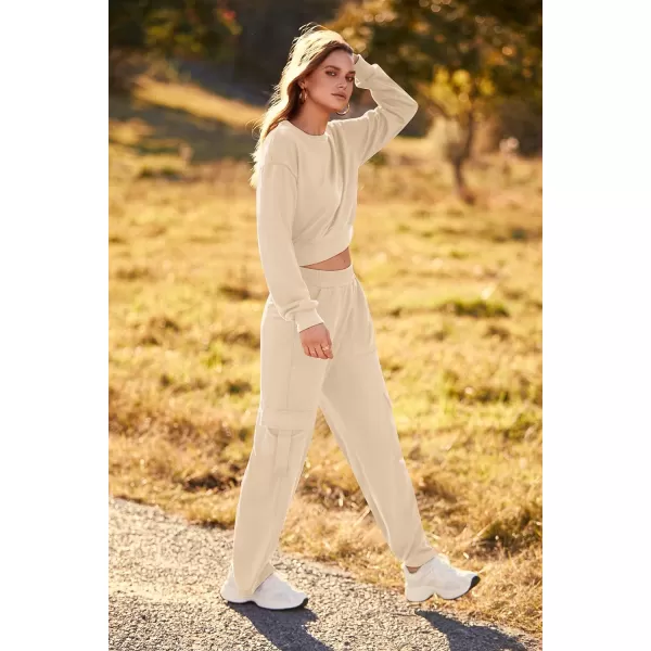 imagePRETTYGARDEN Womens Fall 2 Piece Outfits Sweatsuits Sets Long Sleeve Crop Tops Sweatshirt Wide Leg Cargo Pants with PocketsBeige