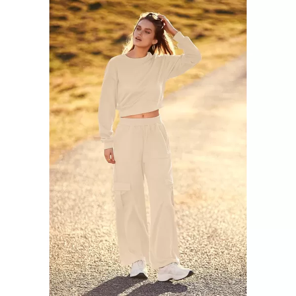 imagePRETTYGARDEN Womens Fall 2 Piece Outfits Sweatsuits Sets Long Sleeve Crop Tops Sweatshirt Wide Leg Cargo Pants with PocketsBeige
