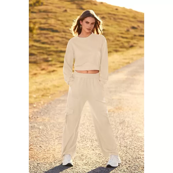 imagePRETTYGARDEN Womens Fall 2 Piece Outfits Sweatsuits Sets Long Sleeve Crop Tops Sweatshirt Wide Leg Cargo Pants with PocketsBeige