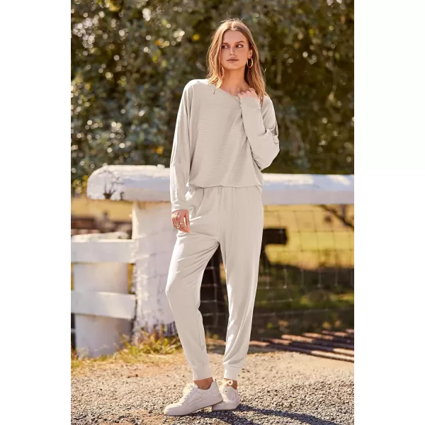imagePRETTYGARDEN Womens Fashion Outfits 2 Piece Sweatsuit Solid Color Long Sleeve Pullover Long PantsApricot