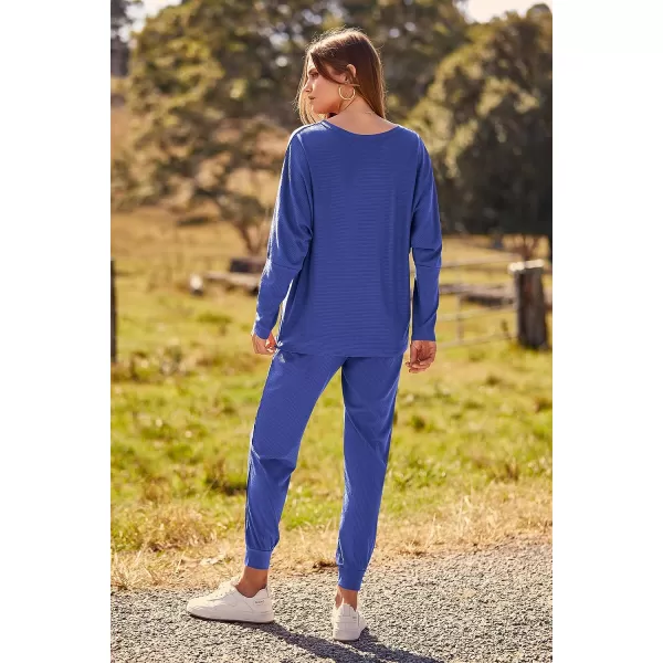 imagePRETTYGARDEN Womens Fashion Outfits 2 Piece Sweatsuit Solid Color Long Sleeve Pullover Long PantsBlue