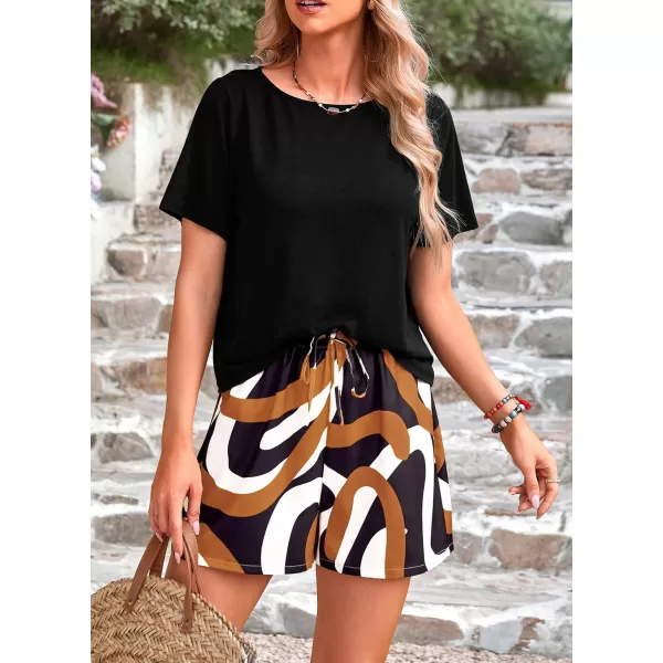 imagePRETTYGARDEN Womens Summer 2 Piece Outfits Lounge Sets Short Sleeve Tee Shirts Tops Blouses Pockets Printed Shorts TracksuitFloral Black Multicolored