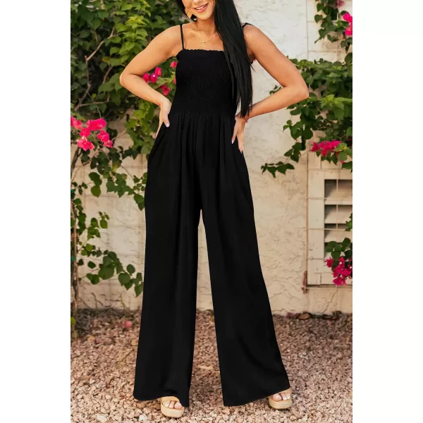imagePRETTYGARDEN Womens Summer Jumpsuits Dressy Casual One Piece Outfits Linen Smocked Spaghetti Strap Pockets Wide Leg RompersBlack