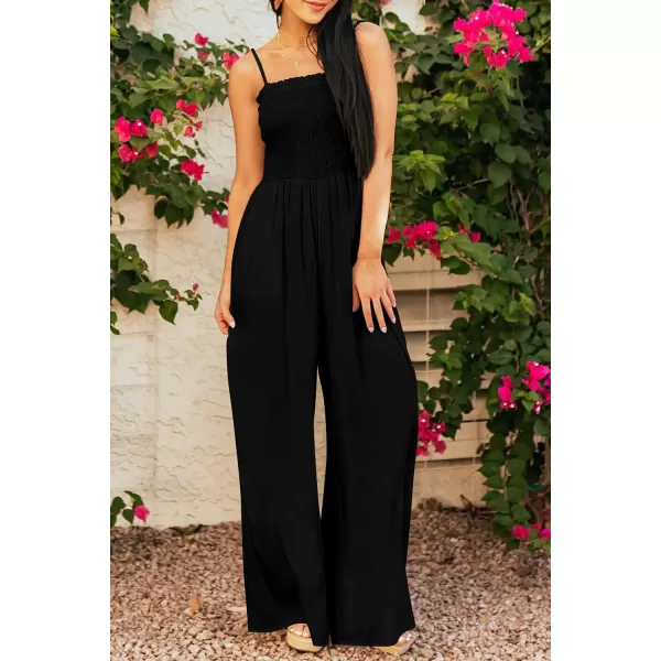 imagePRETTYGARDEN Womens Summer Jumpsuits Dressy Casual One Piece Outfits Linen Smocked Spaghetti Strap Pockets Wide Leg RompersBlack