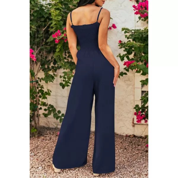 imagePRETTYGARDEN Womens Summer Jumpsuits Dressy Casual One Piece Outfits Linen Smocked Spaghetti Strap Pockets Wide Leg RompersNavy