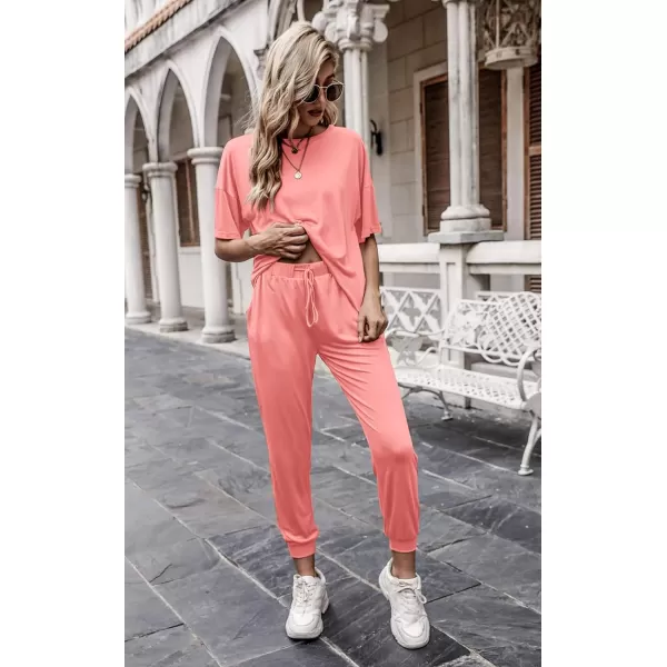 imagePRETTYGARDEN Womens Two Piece Outfit Short Sleeve Pullover with Drawstring Long Pants Tracksuit Jogger SetPink