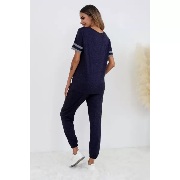 imagePRETTYGARDEN Womens Two Piece Outfit Short Sleeve Pullover with Drawstring Long Pants Tracksuit Jogger SetStriped Navy
