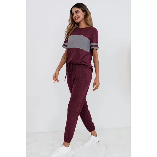 imagePRETTYGARDEN Womens Two Piece Outfit Short Sleeve Pullover with Drawstring Long Pants Tracksuit Jogger SetStriped Wine Red