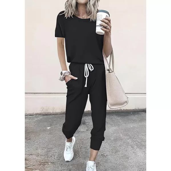 imagePRETTYGARDEN Womens Two Piece Outfits Striped Short Sleeve Pullover and Long Pants Tracksuit Pajama Lounge Jogger SetsSolid Black