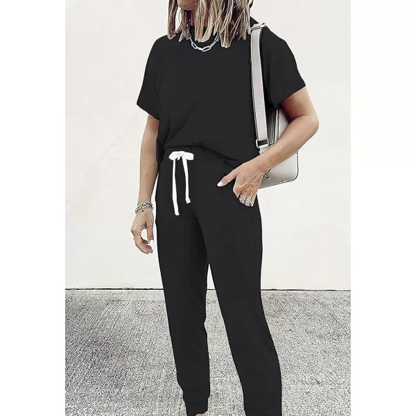 imagePRETTYGARDEN Womens Two Piece Outfits Striped Short Sleeve Pullover and Long Pants Tracksuit Pajama Lounge Jogger SetsSolid Black