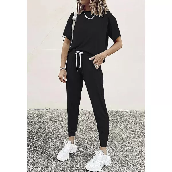 imagePRETTYGARDEN Womens Two Piece Outfits Striped Short Sleeve Pullover and Long Pants Tracksuit Pajama Lounge Jogger SetsSolid Black