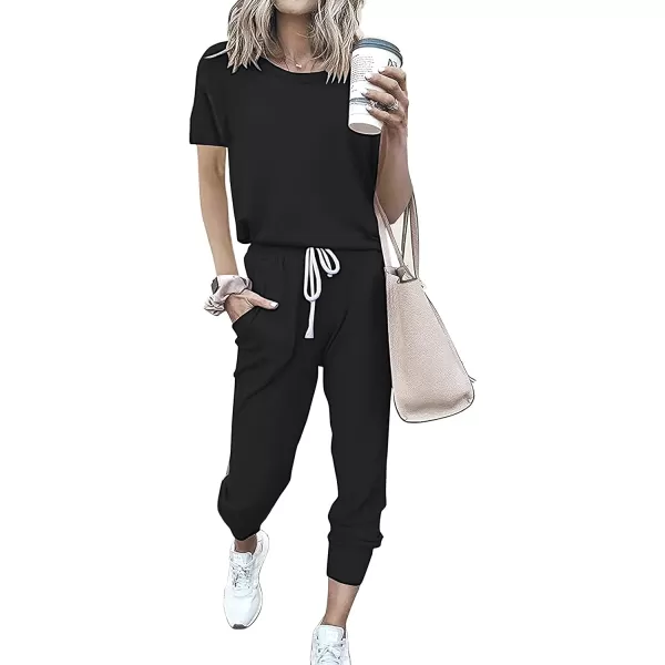 imagePRETTYGARDEN Womens Two Piece Outfits Striped Short Sleeve Pullover and Long Pants Tracksuit Pajama Lounge Jogger SetsSolid Black