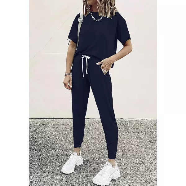 imagePRETTYGARDEN Womens Two Piece Outfits Striped Short Sleeve Pullover and Long Pants Tracksuit Pajama Lounge Jogger SetsSolid Navy