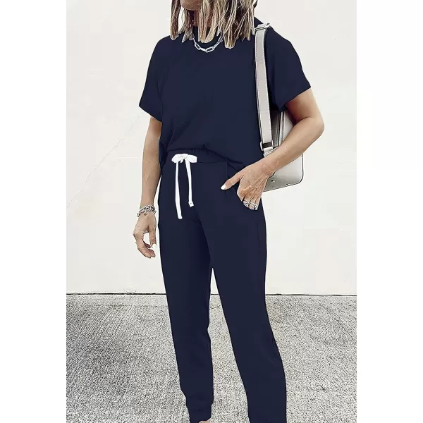 imagePRETTYGARDEN Womens Two Piece Outfits Striped Short Sleeve Pullover and Long Pants Tracksuit Pajama Lounge Jogger SetsSolid Navy