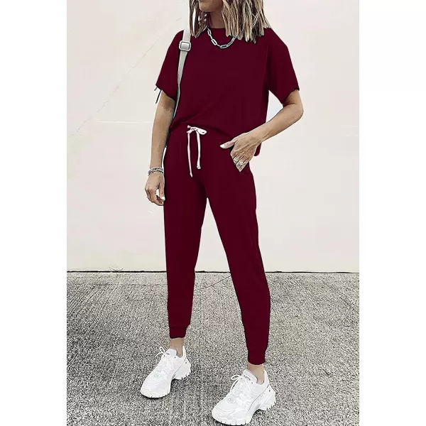imagePRETTYGARDEN Womens Two Piece Outfits Striped Short Sleeve Pullover and Long Pants Tracksuit Pajama Lounge Jogger SetsSolid Wine Red