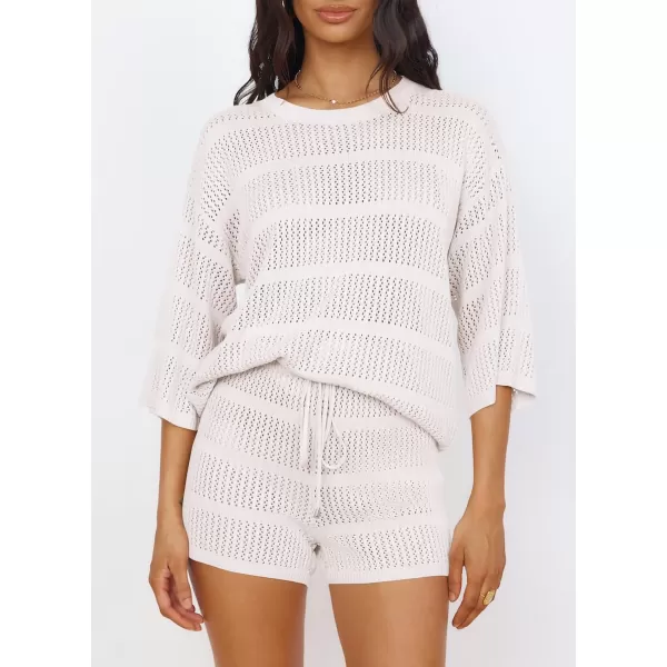 imagePRETTYGARDEN Womens Two Piece Outfits Summer Hollow Out Knit Lounge Sets Half Sleeve Tops Blouses and Shorts TracksuitBeige White