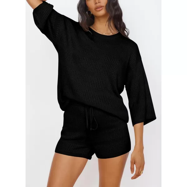 imagePRETTYGARDEN Womens Two Piece Outfits Summer Hollow Out Knit Lounge Sets Half Sleeve Tops Blouses and Shorts TracksuitBlack